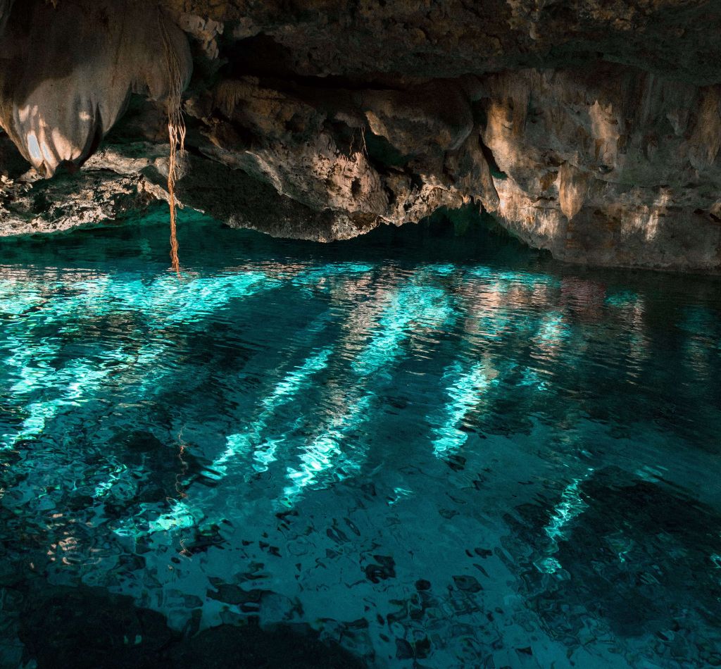 Cave Cenote filled with clear blue water